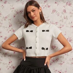 DOLLED UP White Short Sleeved Cardigan with Black Bow Accents S M L